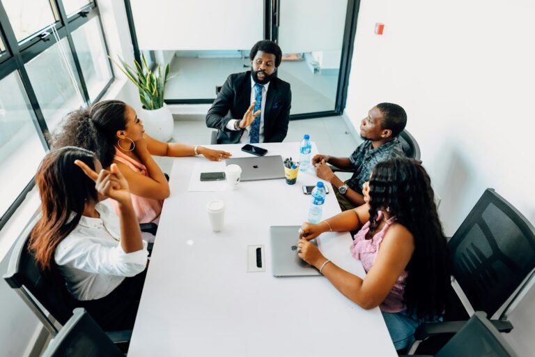 Professional team discussing work together in a conference room