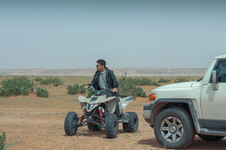 Mid adult man enjoying off-road ATV adventure near Riyadh, Saudi Arabia.